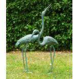 Two bronze storks, the larger 119cm high (2)Of modern manufacture, with minor marks to the patina