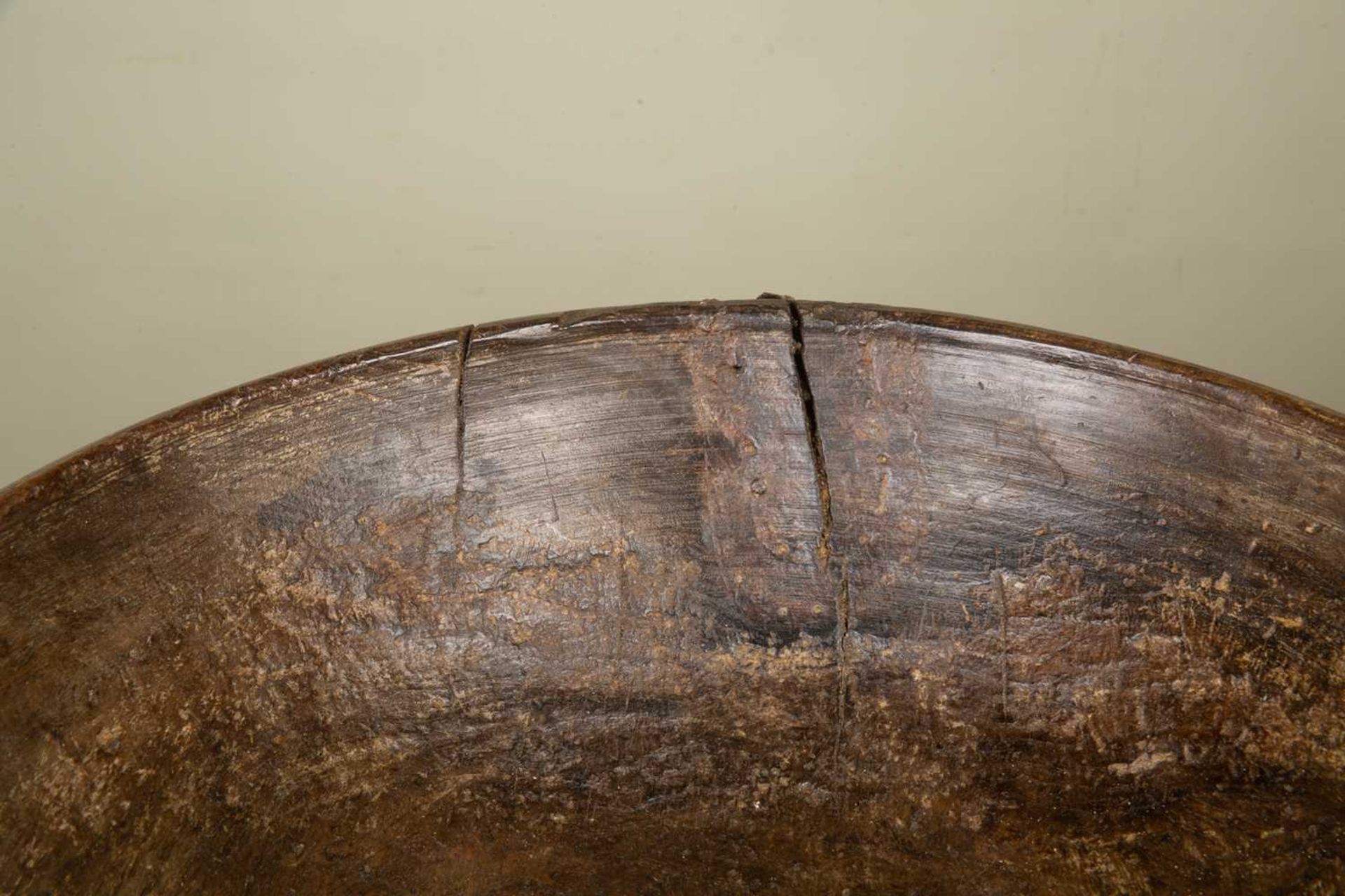 An antique turned sycamore dairy bowl, with old splits and old wrought iron patch, 42cm diameterThis - Image 3 of 4