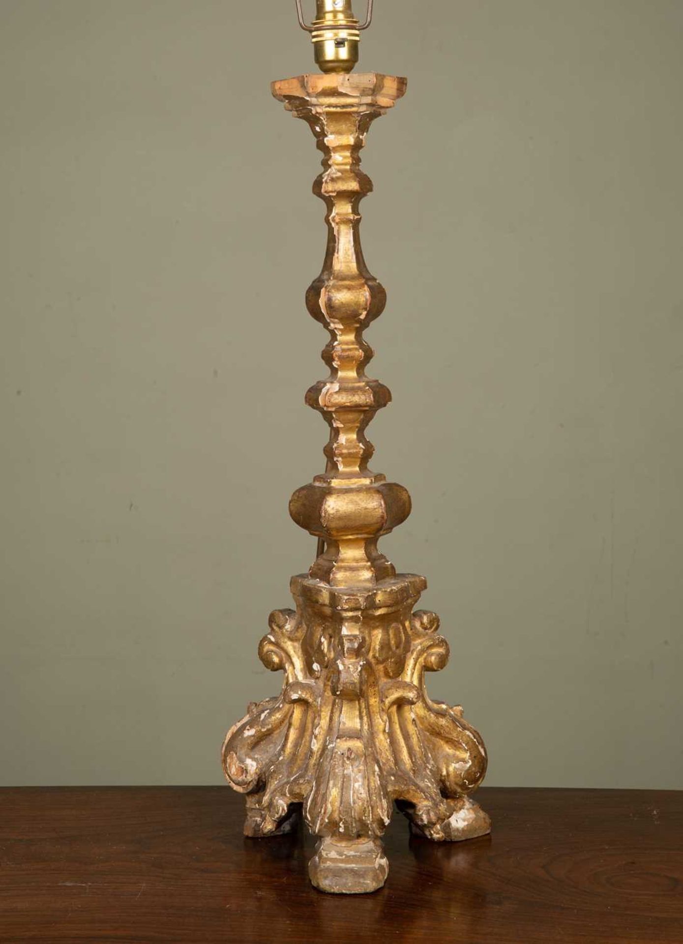 A giltwood table lamp of tapering form on tripod base, 58cm highChips and scratches to paintwork;