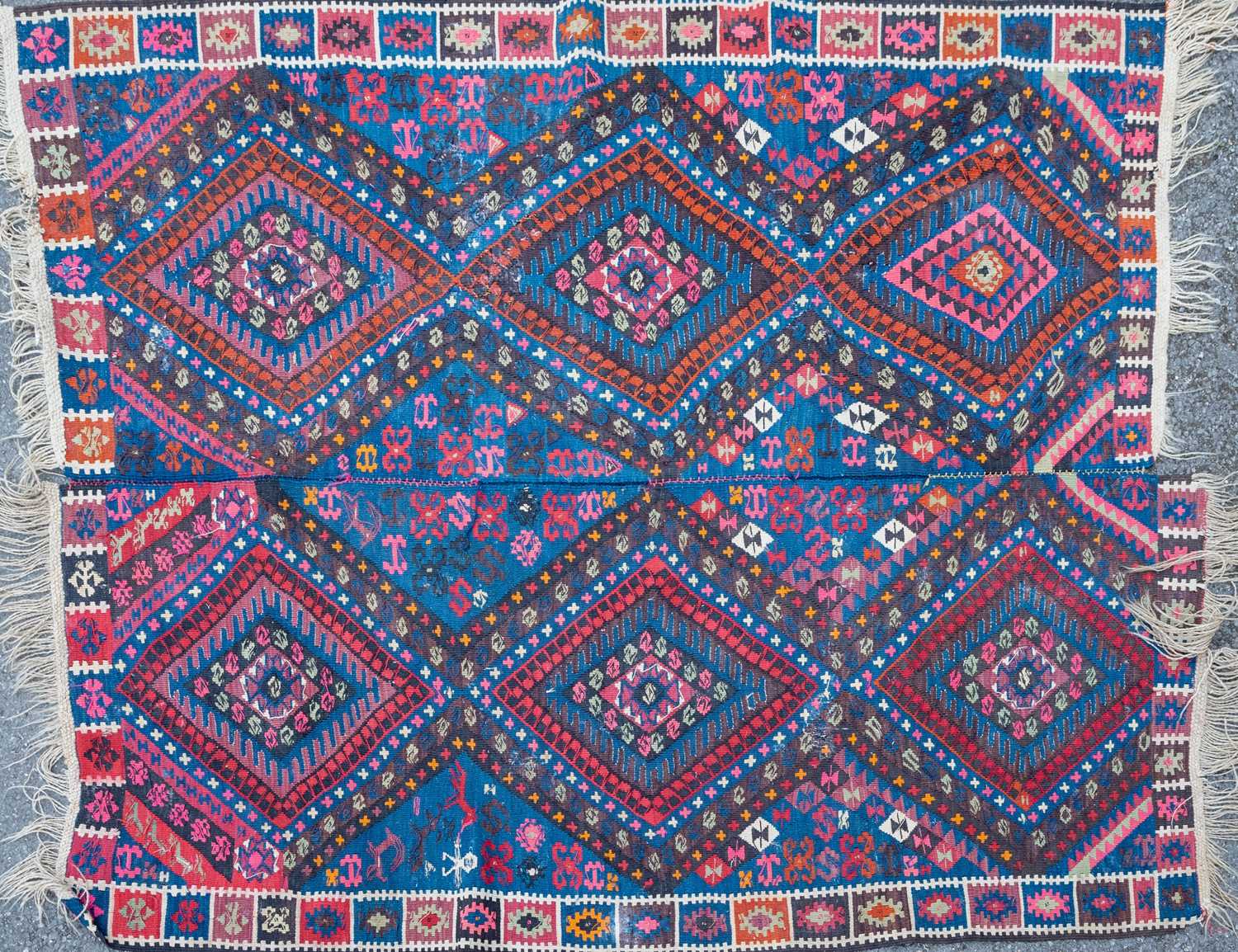 A blue ground Kelim with all over diamond pattern, 170cm x 210cmKelim constructed from two smaller