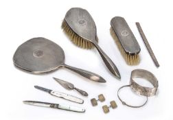 Collection of miscellaneous silver comprising of: silver backed brushes, bangles, bookmark,