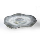 Loetz style Large iridescent glass dish, polished pontil to the base, unsigned, 59cm acrossWith