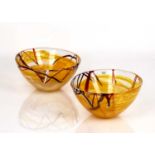 Anna Ehrner (b.1948) for Kosta Boda 'Orange contrast', two studio glass bowls, with original labels,
