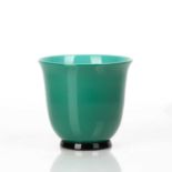 Designed by Paolo Venini (1895-1959) for Murano green glass vase on black foot, signed 'Venini,