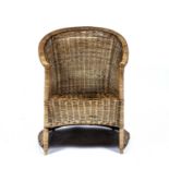 Dryad's wicker armchair with plaque to the reverse, 80cm high approx overallOverall wear, some dust,