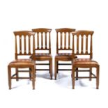 Arts and Crafts Set of four oak dining chairs, with drop-in seats and pierced splats, unmarked,