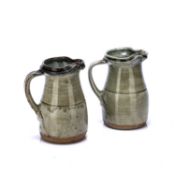 Richard Batterham (1936-2021) two studio pottery jugs, ash glazed, one is 17cm high, the other is