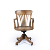 Early 20th Century Oak swivel or desk chair, on castors, unmarked, 92.5cm high overallSigns of heavy