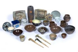 Collection of studio pottery comprising of: studio pottery bowls and mugs in the style of Walter
