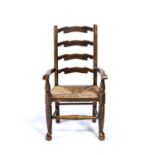 Early 20th Century Oak, ladder back child's chair, with raffia seat, unmarked, 75cm highOverall with