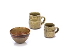 Richard Batterham (1936-2021) two ash glazed mugs, unmarked, 10cm high and 8cm high and a Robin