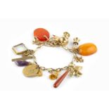 A charm bracelet, the yellow precious metal curb-link bracelet with clasp stamped '9CT',