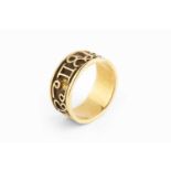 A zodiac dress ring, the uniform band applied with a frieze of astrological motifs to a textured