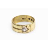 A late Victorian diamond set band ring, modelled as a belt, with an old-cut diamond accent and