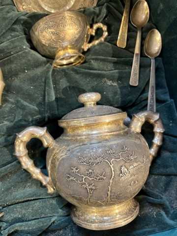 An extensive Vietnamese silver tea service, relief decorated and engraved with landscape - Image 6 of 10