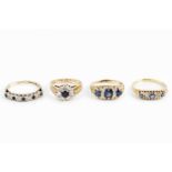 A sapphire and diamond half hoop ring, the trio of circular mixed-cut sapphires spaced by pairs of