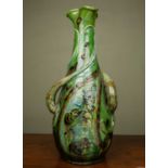 A large Brannam ware vase, the green ground decorated with fish, three handles formed as