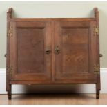 A Victorian-style oak wall shelf, with brass handles and hinges, 58cm wide x 12cm deep x 60cm