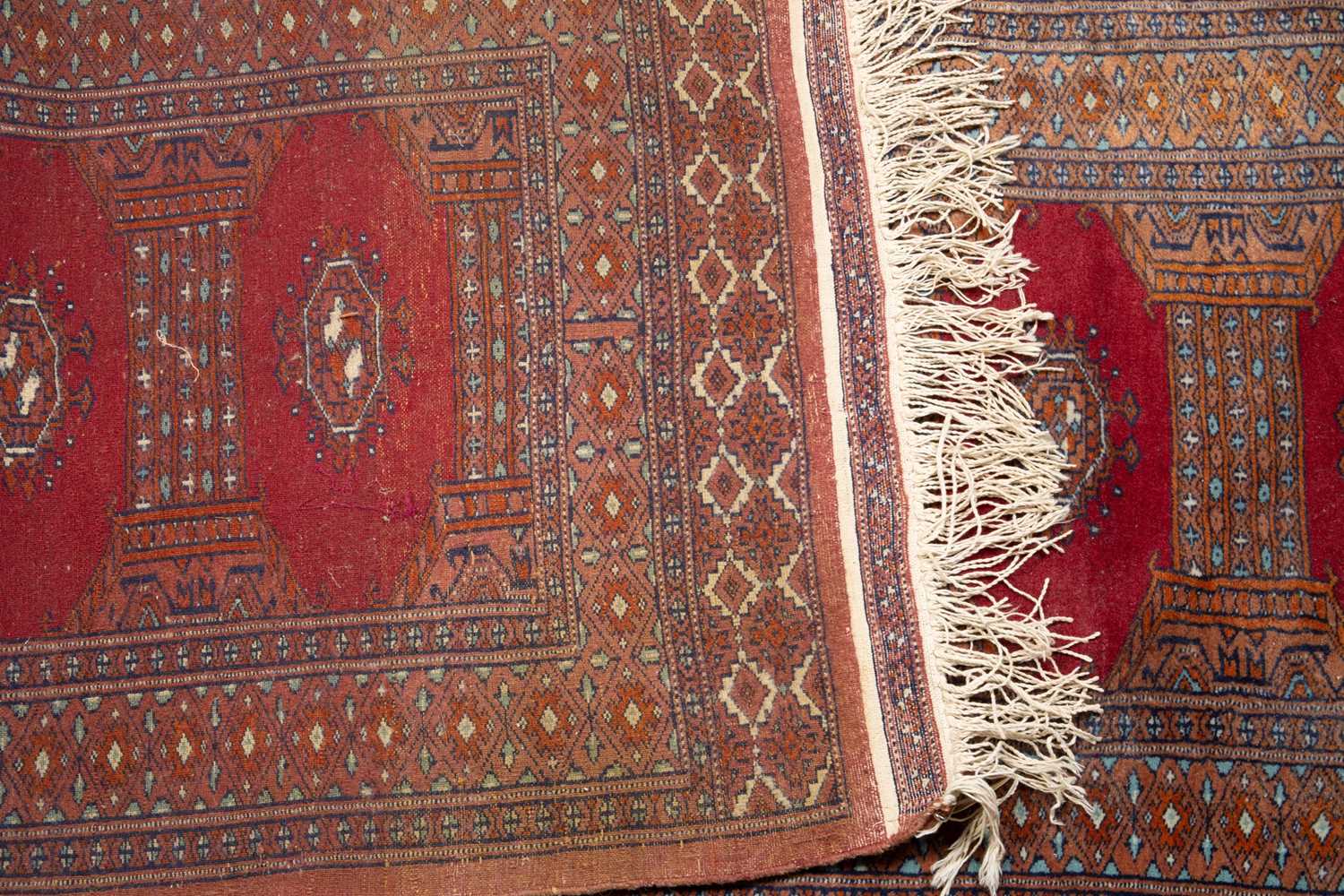 Three middle eastern rugs to include a red ground runner and a 20th century turkish rug. the largest - Image 4 of 8