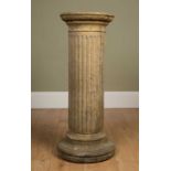 A cast reconstituted stone sculpture plinth or column, 32.5cm diameter and 86cm highIn good