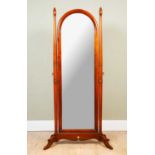 A mahogany framed cheval mirror flanked by turned columns on trestle base, 64cm wide x 184cm