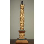 A giltwood table lamp of carved column form, on stepped plinth base, 56cm high excluding fittingsPAT