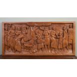 A carved hardwood panel possibly African, 116cm wide x 54cm highIn good condition