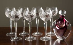 A set of seven Hock glasses with cut glass bowls on facetted stems 18.5cm high, together with an art