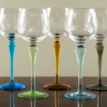 A set of ten Hock glasses with cut glass bowls on various coloured stems, 19cm high (10)Some surface
