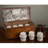 Seven ceramic spice jars, each 8cm in height in a 19th century fruitwood box, 34cm wide