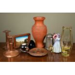 Two arts and crafts copper candlesticks and various other decorative ornaments, to include a