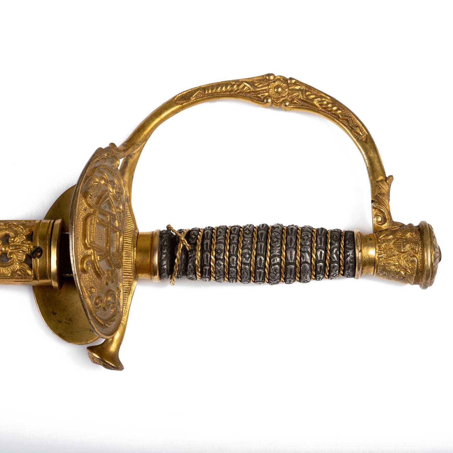 A gilt metal dress sword, with engraved scrolling decoration on the blade and scabbard, 97cm long, - Image 3 of 3