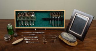 A group of silver and silver plated items to include a set of six silver teaspoons with bear
