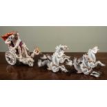 A German porcelain figural group depicting Neptune and Triton riding a chariot pulled by four