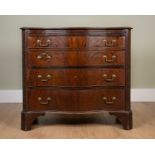 A George III-style serpentine chest of four graduated drawers over a brushing slide, with blind