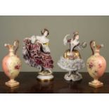 Two continental porcelain figurines of elegantly dressed women with floral headdresses, 32cm high,