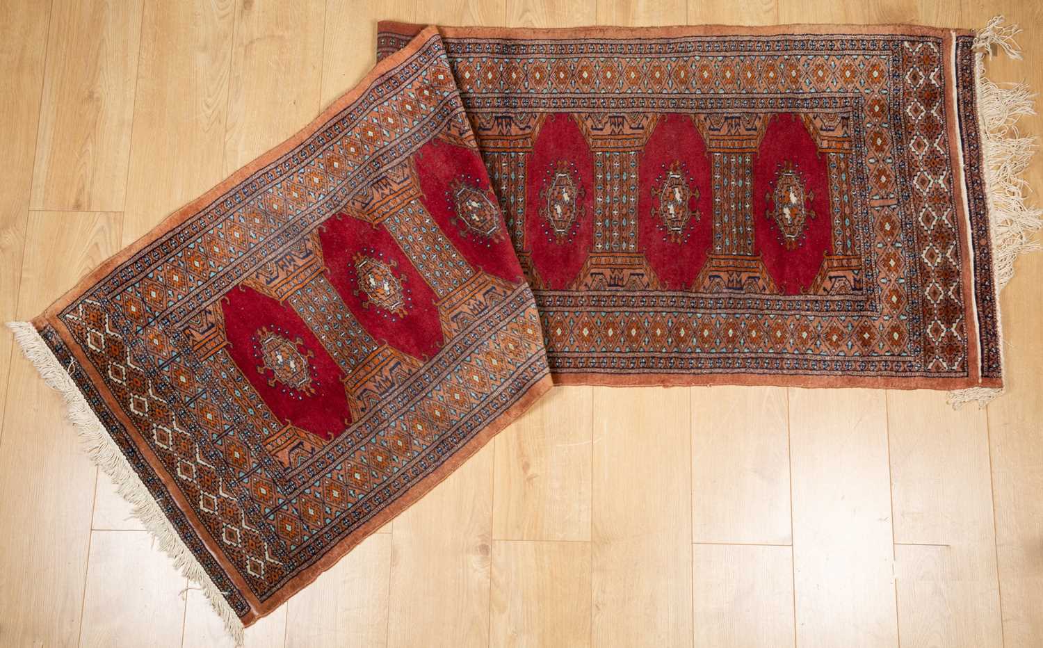 Three middle eastern rugs to include a red ground runner and a 20th century turkish rug. the largest - Image 2 of 8