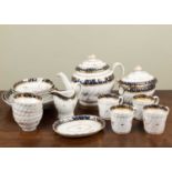A Chamberlains Worcester part tea and coffee set, with gadrooned decoration to each piece and blue