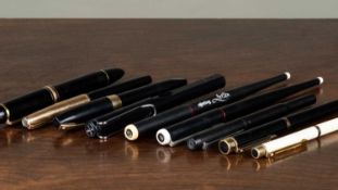 A group of pens including a Mont Blanc fountain pen, with 14CT gold nib, two Sheafer fountain pens