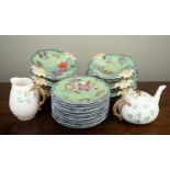 An iron stone china part dessert service, comprising six tazzas and twelve bread and butter