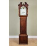 A George III oak longcase clock the hood with break arch pediment, the arching dial with moon phase,