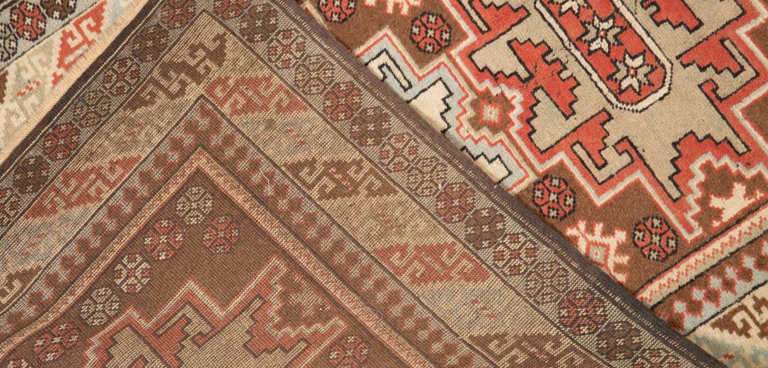 Three middle eastern rugs to include a red ground runner and a 20th century turkish rug. the largest - Image 6 of 8