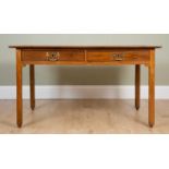 A 19th century mahogany writing table with rectangular top, two frieze drawers and square legs,