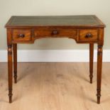 A mahogany leather topped writing table, with three drawers, on turned legs, 93cm wide x 49cm deep x