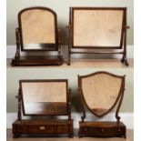 A group of four dressing table mirrors; including a Georgian mahogany serpentine fronted example