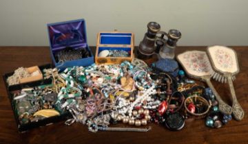 A large collection of costume jewellery to include necklaces, bracelets, earrings, brooches etc;