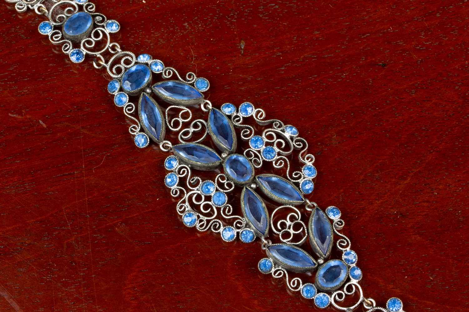 A continental white metal bracelet set with blue stones; together with a silver cigarette case - Image 5 of 5