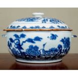 An 18th Century Chinese porcelain tureen and cover, 26cm diameter x 17.5cm high (damages overall)