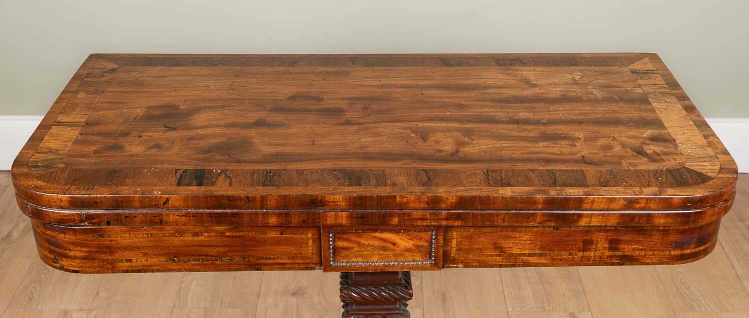 A George IV mahogany foldover card table with rosewood cross banded top, carved support and four - Image 4 of 7