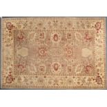 A Zeigler style light coloured rug with floral decoration, 269cm x 187cmSome fading and minor